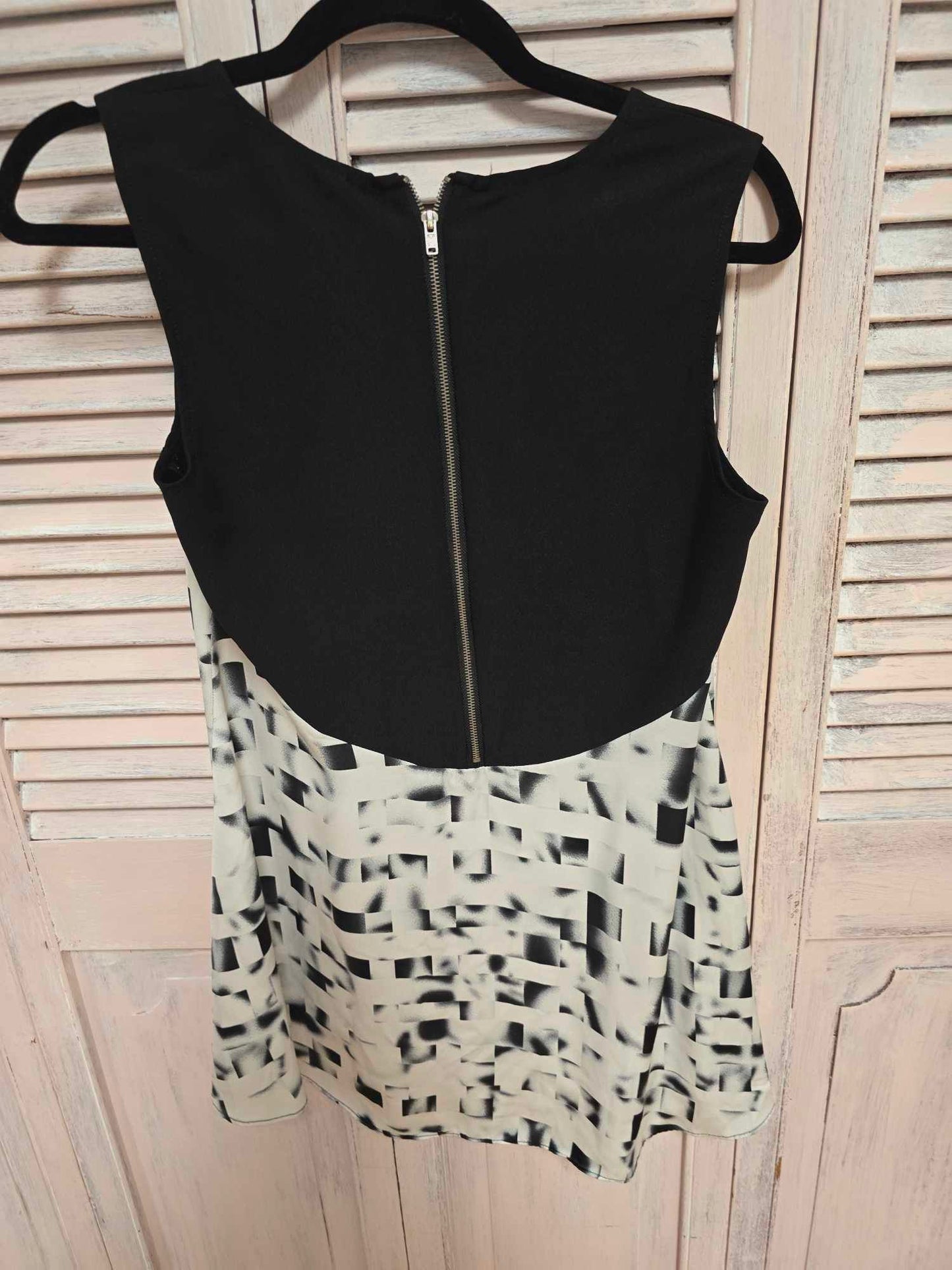 Cleo Sleeveless Blouse